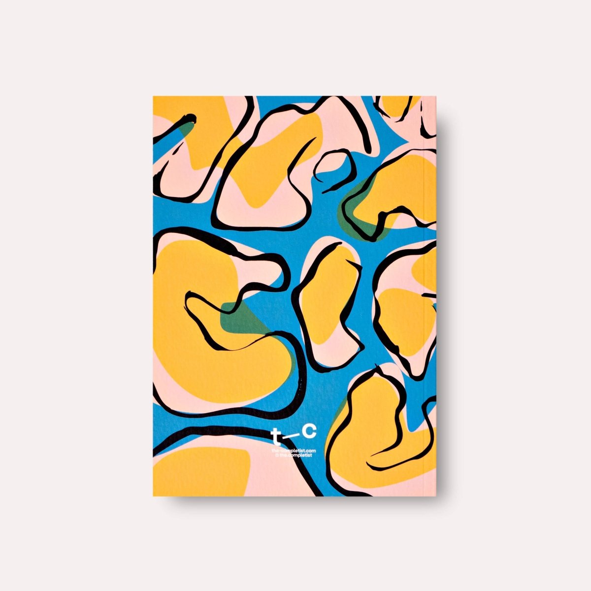 Cover of The Completist Overlay Flowers No. 1 lay-flat undated weekly planner book with floral design.