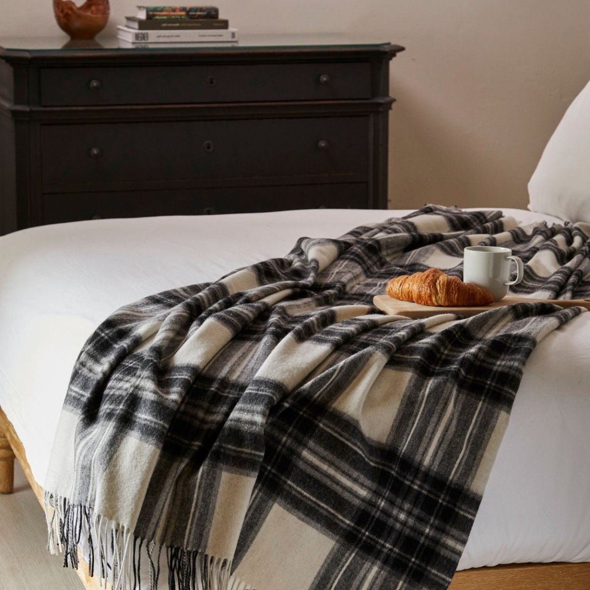 Cream Tweedmill Lambswool Wool Blanket with textured weave, soft and cozy for warm bedding or lounging.