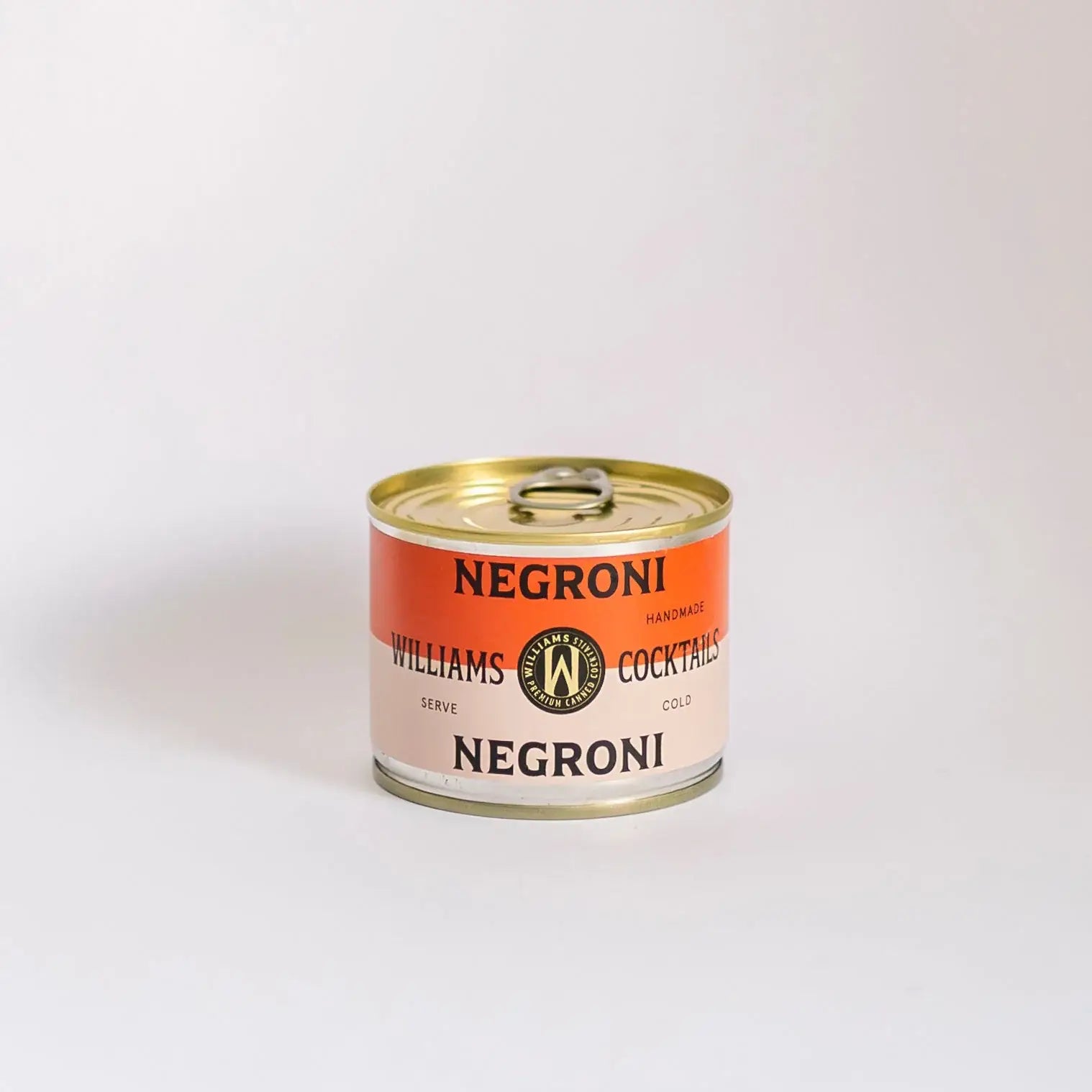 Williams Premium Canned Cocktails Negroni with vibrant orange and red hues, showcasing the ready-to-drink cocktail in a sleek can.