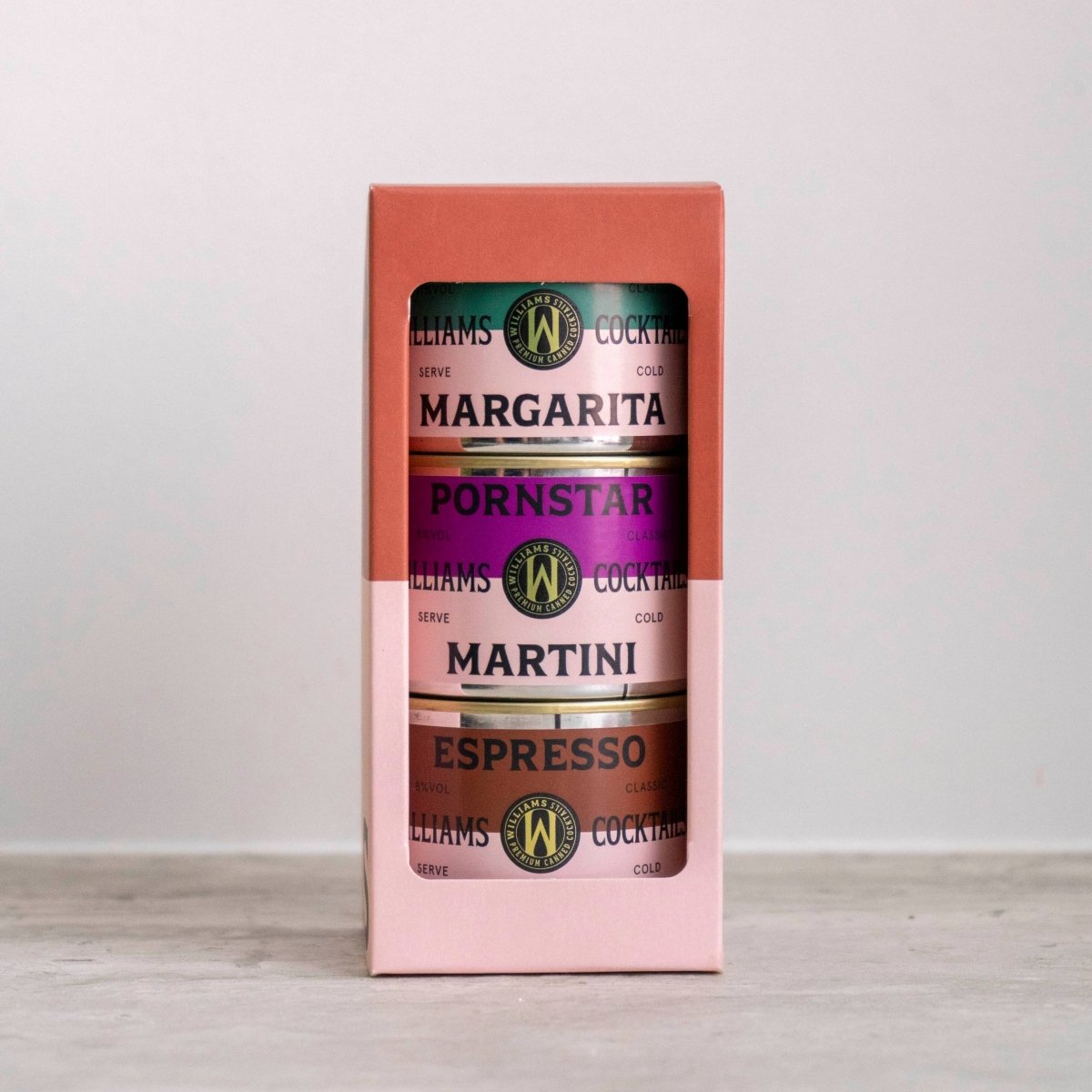 Set of 3 Williams Premium Canned Cocktails featuring colorful cans with fruit illustrations and cocktail branding.