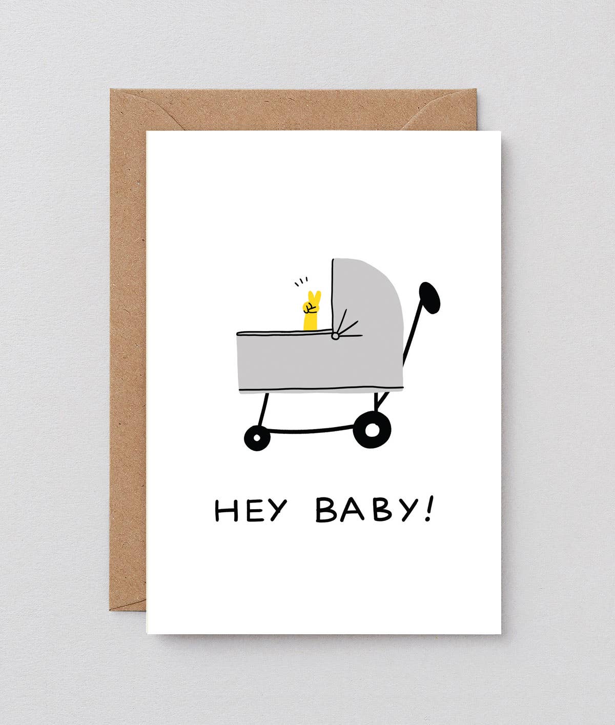 "Wrap 'Hey Baby' greetings card featuring playful typography and colorful design, perfect for celebrating a new arrival."