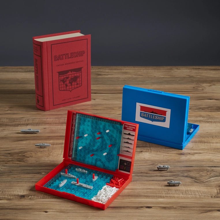 Vintage Battleship game from WS Game Company, featuring classic artwork and wooden game pieces on a bookshelf-style display.