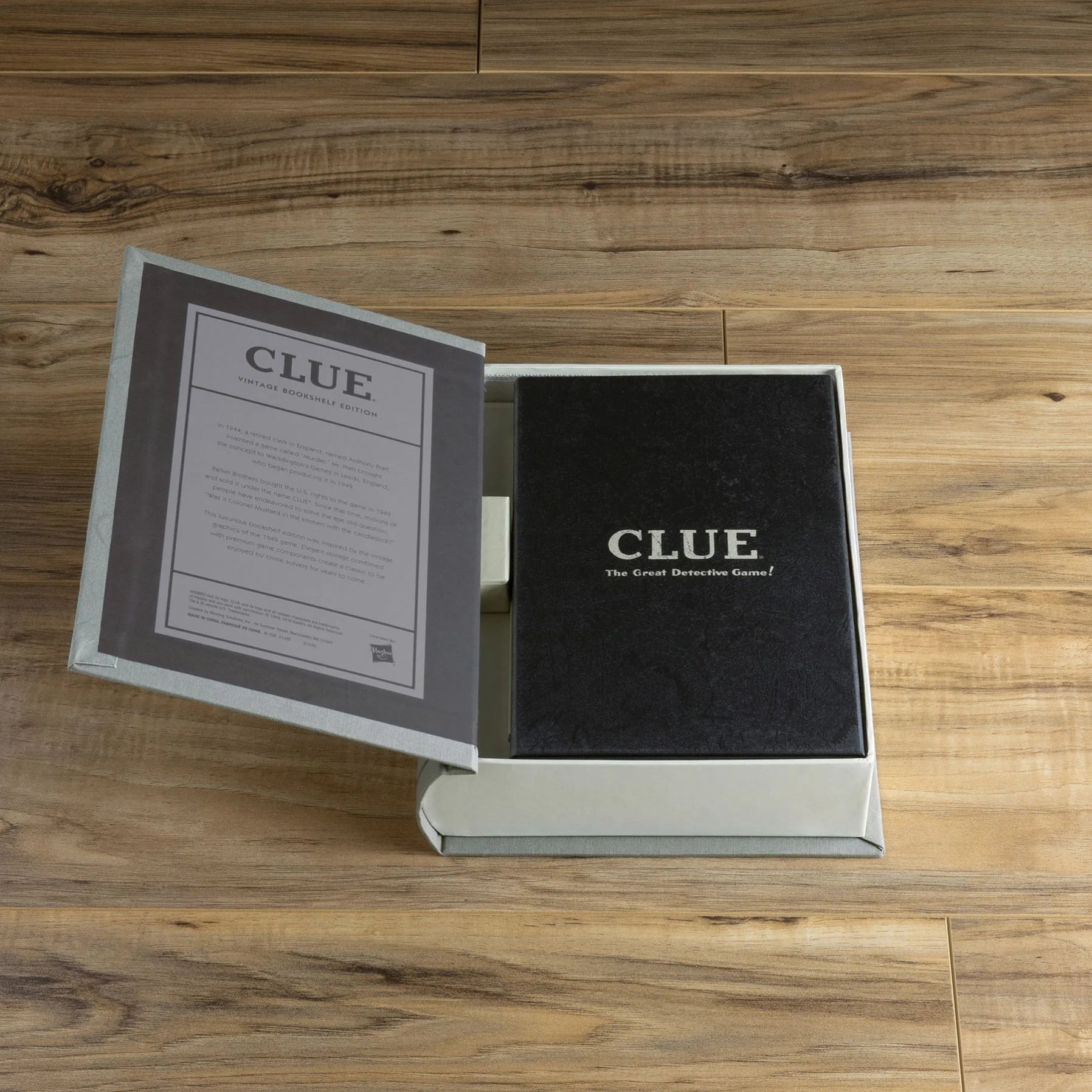 Vintage Bookshelf Edition Clue board game by WS Game Company featuring classic book-themed artwork and game components.