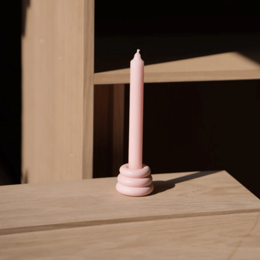 YOD&CO Triple O Candleholder in baby pink with three circular holders for candles, modern decorative piece.