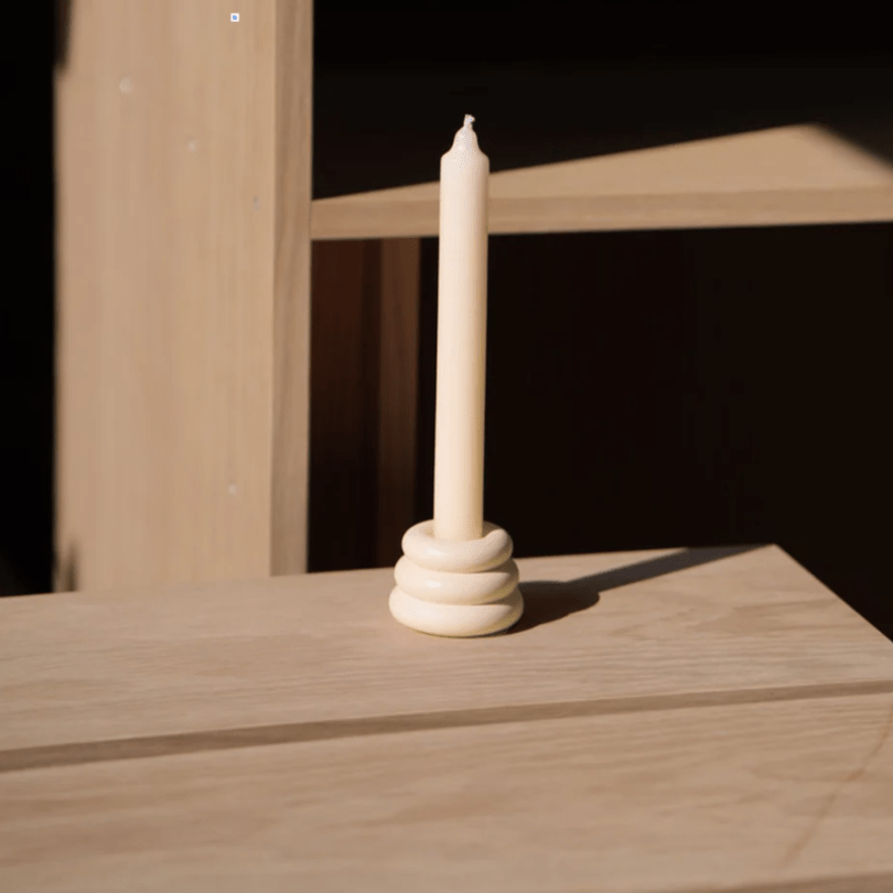 Triple O Candleholder by YOD&CO in pale yellow with three candle slots, modern design, and smooth finish.