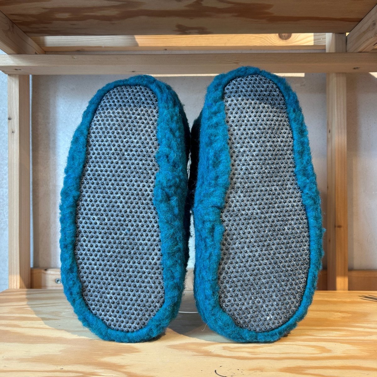 Unisex Wool Slippers by Yoko Wool in azure blue, featuring soft wool material and a comfortable slip-on design.