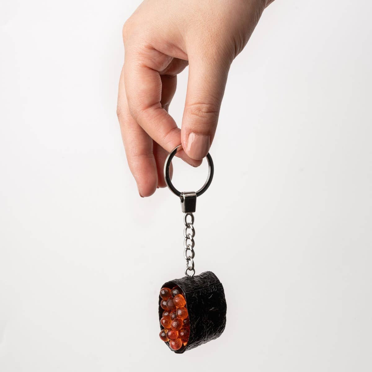 Yumazing Connectrade AG Keychain with adorable Ikura Sushi design, featuring realistic orange salmon eggs on a small sushi piece.