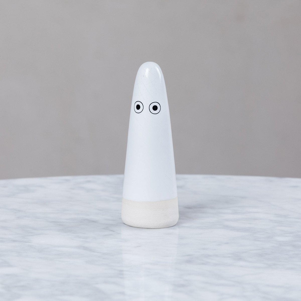 Studio Arhoj ceramic Ghost figurine with a glossy white finish and playful design.